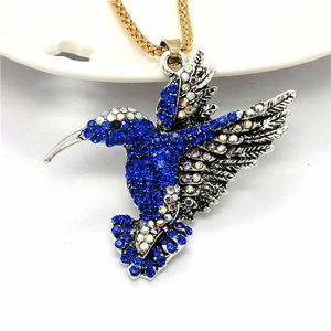 Jewelry - Hummingbird with blue crystals necklace Jewelry - Hummingbird with blue crystals necklace